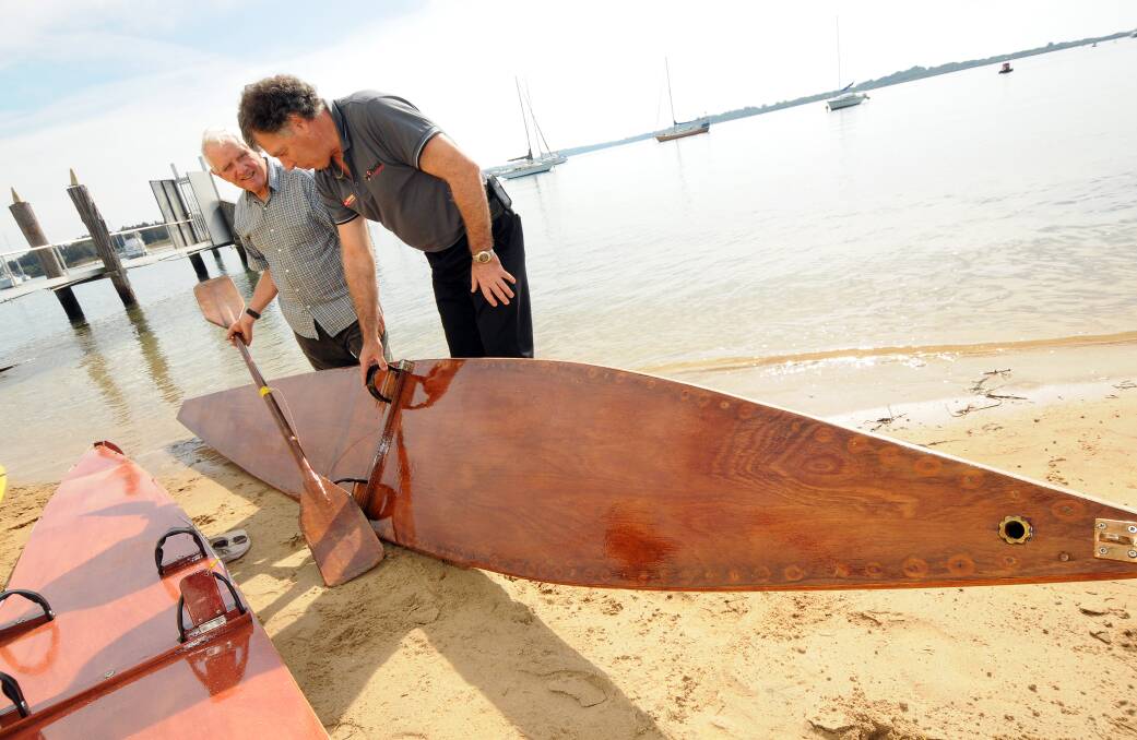 Jim Pullen and Allan Witchard with the restored surf ski.
