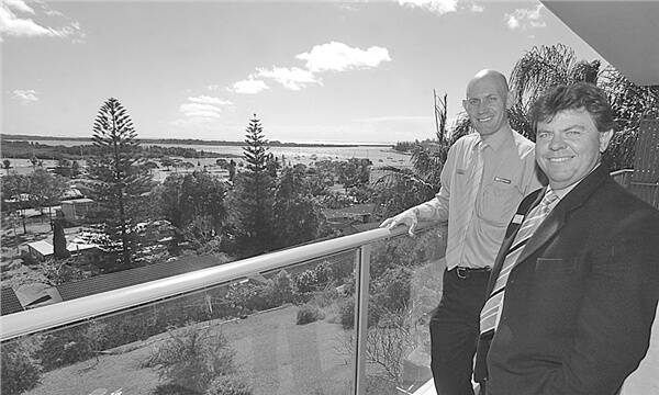 At last: Estate agents Greg Laws and Mark Carter check out the view from Port Macquarie’s Icon Apartments.