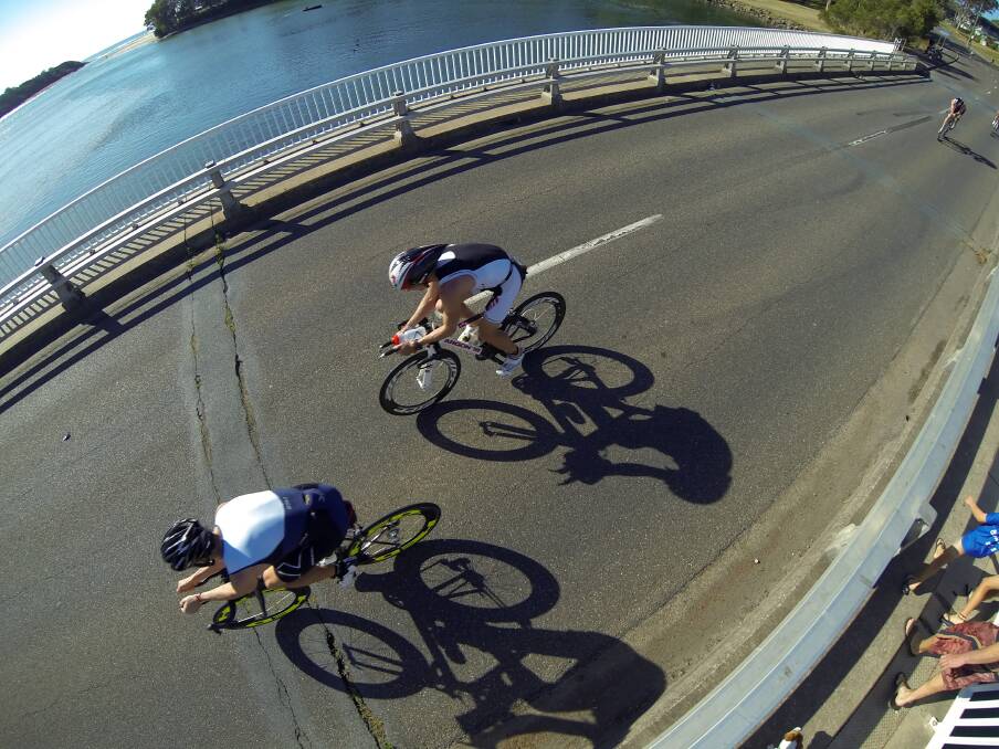 Top shot: Port News photographer Peter Gleeson snapped this fantastic shot of competitors going over Lake Cathie bridge. You can check out more of our Ironman photo galleries by clicking www.portnews.com.au.
