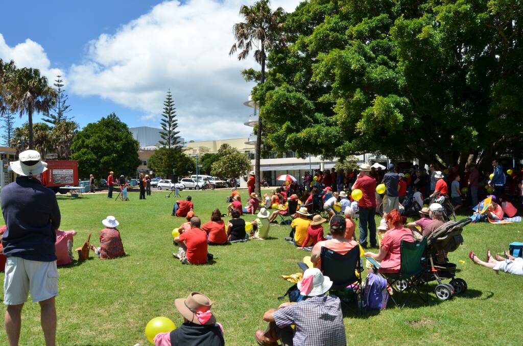Orange rally: Hundreds gathered on Town Green yesterday to call for firmer action on climate change from political leaders.