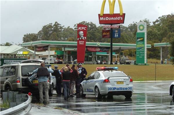Police repsond to the siege at McDonald's this morning.
