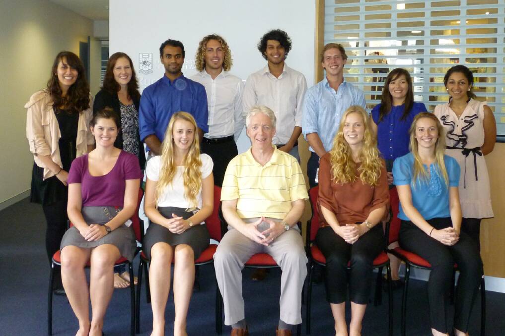 Starting out: James, pictured at rear and three in from the right, was full of enthusiasm when he and his cohort of fourth-year students started work in Port Macquarie. James' mentor, Dr Sandy McColl, is sitting in the centre. 
 
Source: UNSW Rural Clinical School