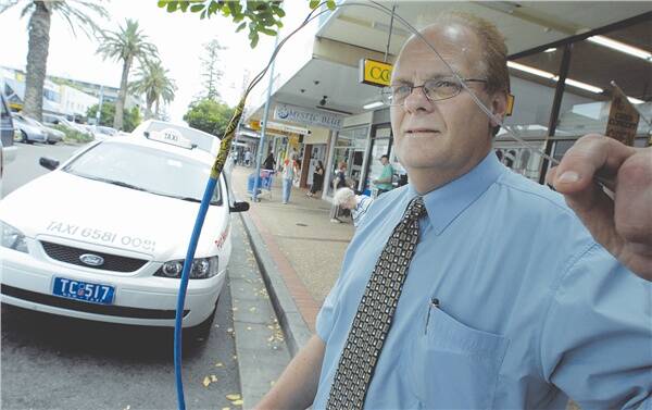 On the pulse: TSN business development manager Rob Martin says the fibre optic cabling he is holding will vastly improve camera footage captured for taxis and police in the CBD.