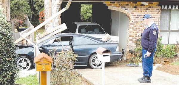 A full stop: The remnants of Joe and Mavis Quinn’s garage after yesterday’s crash.  Pic: NIGEL McNEIL