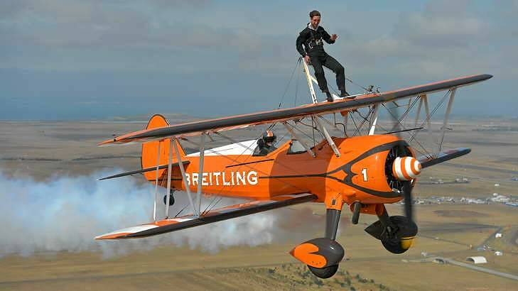 Journalist Nino Bucci takes a ride flying on Breitling wingwalkers at the Australian Airshow.