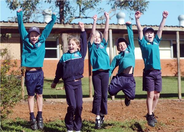 Big win for little learners: Max Milligan, Ellie Richards, Ella Reynolds, Matthew Hingston and Braden Clarke can look forward to permanent surroundings at Tacking Point Public School. Pic: PETER GLEESON