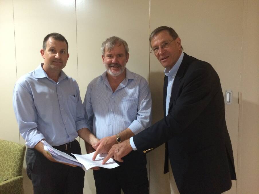 Full steam ahead: Port Macquarie Basketball Assocation vice-president Andrew Lister with residents' spokesman Grahame Wilson and the Northern Joint Regional Planning Panel chair Garry West.