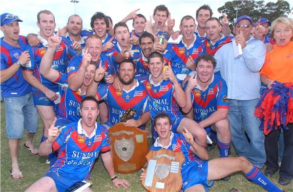 Breaking the premiership drought: The Wauchope Blues celebrate yesterday’s 32-10 victory over Group 3 defending champions Port City Breakers at the Lank Bain Sporting Complex yesterday. Pic: PETER GLEESON