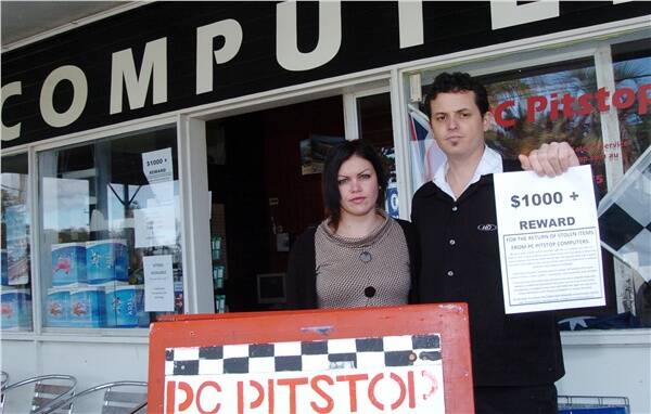 ffering a $1000 for information about their break-in: Sam Clark and her partner Ben Waters outside their PC Pitstop Computers business.