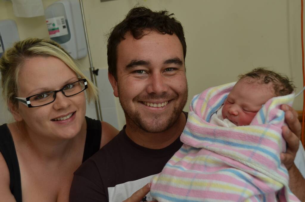 Happy family: New Year's Day will always be special for proud parents Jessie and Shane Bryans and their daughter Charlotte.