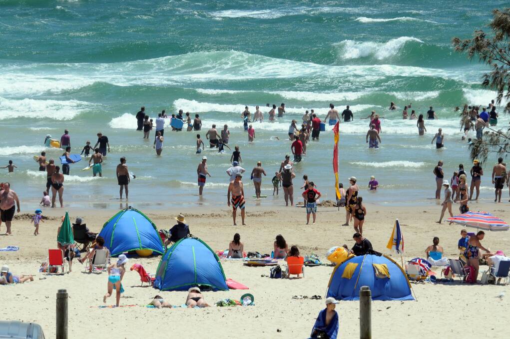 A crowded Town Beach in Port Macquarie earlier today.