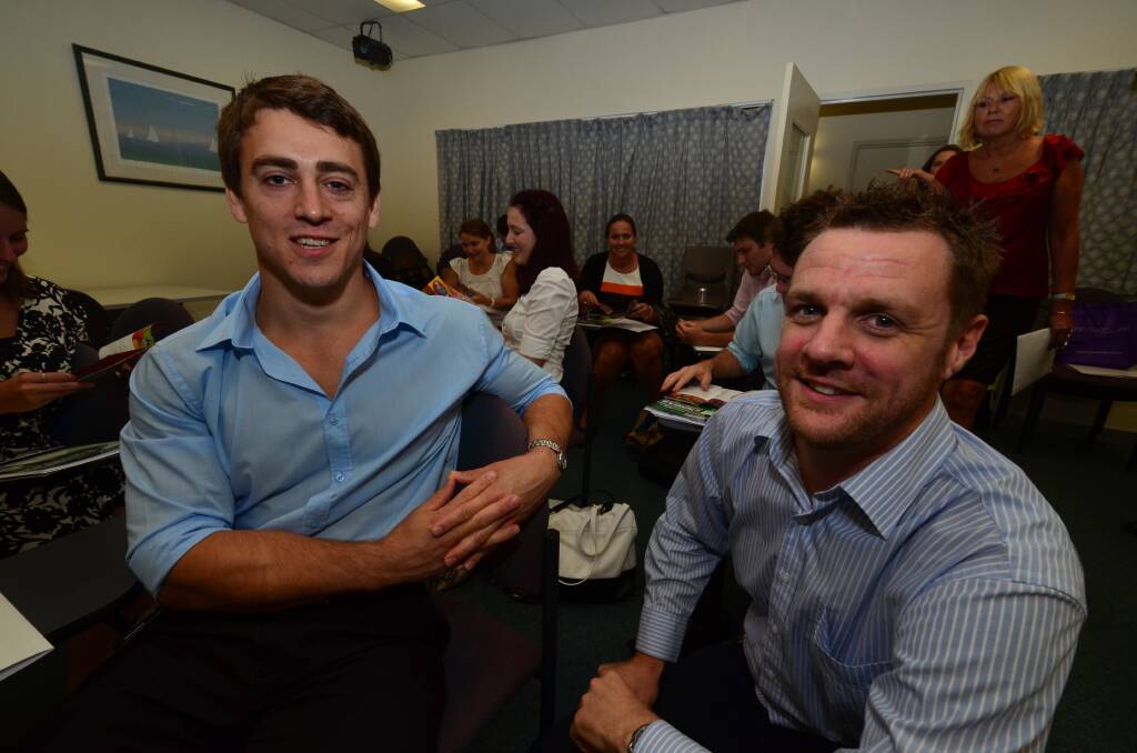 Bright careers: New interns Andrew Stevens and Hayden de Mouncey share a laugh on the job.