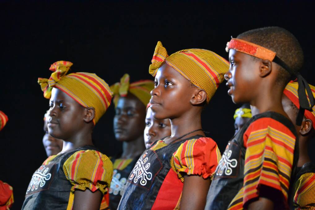 A sell-out: The African Children’s Choir performs at North Haven Bowling Club on Saturday night during its highly anticipated local tour. Pic: KATE DWYER