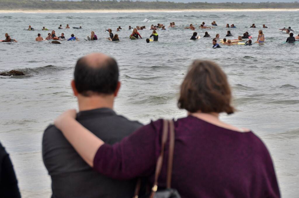 Friends, family, church colleagues and mates gathered at Town Beach this morning for a "paddle" in honour of the late Zac Young. Pic MATTHEW ATTARD