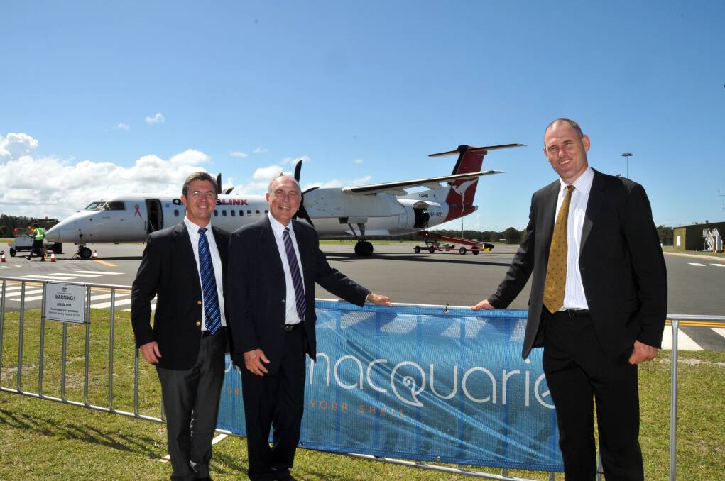 Open for business: Member for Lyne Dr David Gillespie, Deputy Prime Minister Warren Truss and Mayor Peter Besseling unveil the upgraded Port Macquarie Airport.