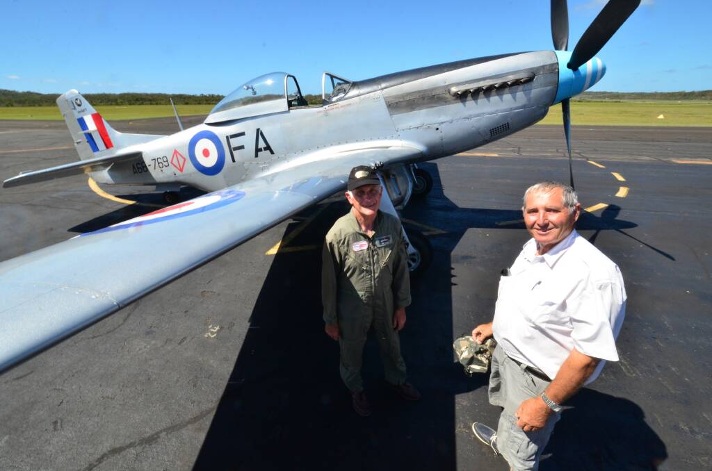 Top gun: Bill Lane (right) with pilot Geoff Kubank before the pair embarked on a trip in the historical WWII Mustang fighter plane on Friday.
