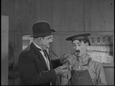 Master of comedy: Clyde Cook (right) with Oliver Hardy in the 1926 film Wandering Papas. Cook was said to be the "star vehicle" of his films. Pic: Courtesy of Nick Cook and Mitch McKay.