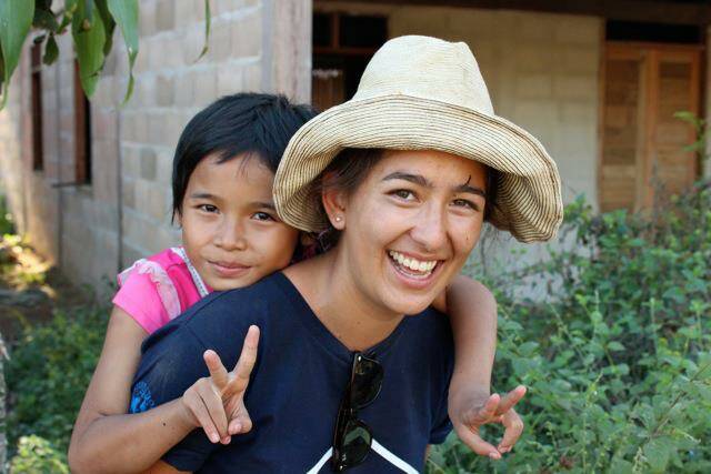 Making a  difference: Kirsten Gan enjoys time with some young Karen refugees living along the Thai/Burmese border.