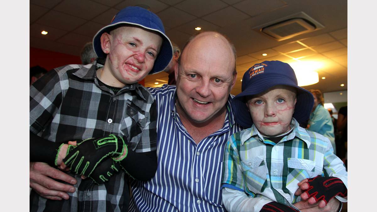 Former Geelong player Billy Brownless helps out with a fundraiser for burns victims, Fletcher, 9, and Spencer, 6. PHOTO: The Advocate.