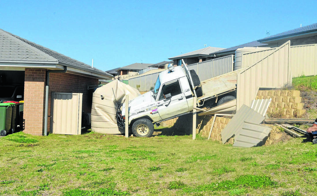 A ute made an unscheduled pit stop in the yard of an Orange home. PHOTO: Central Western Daily.