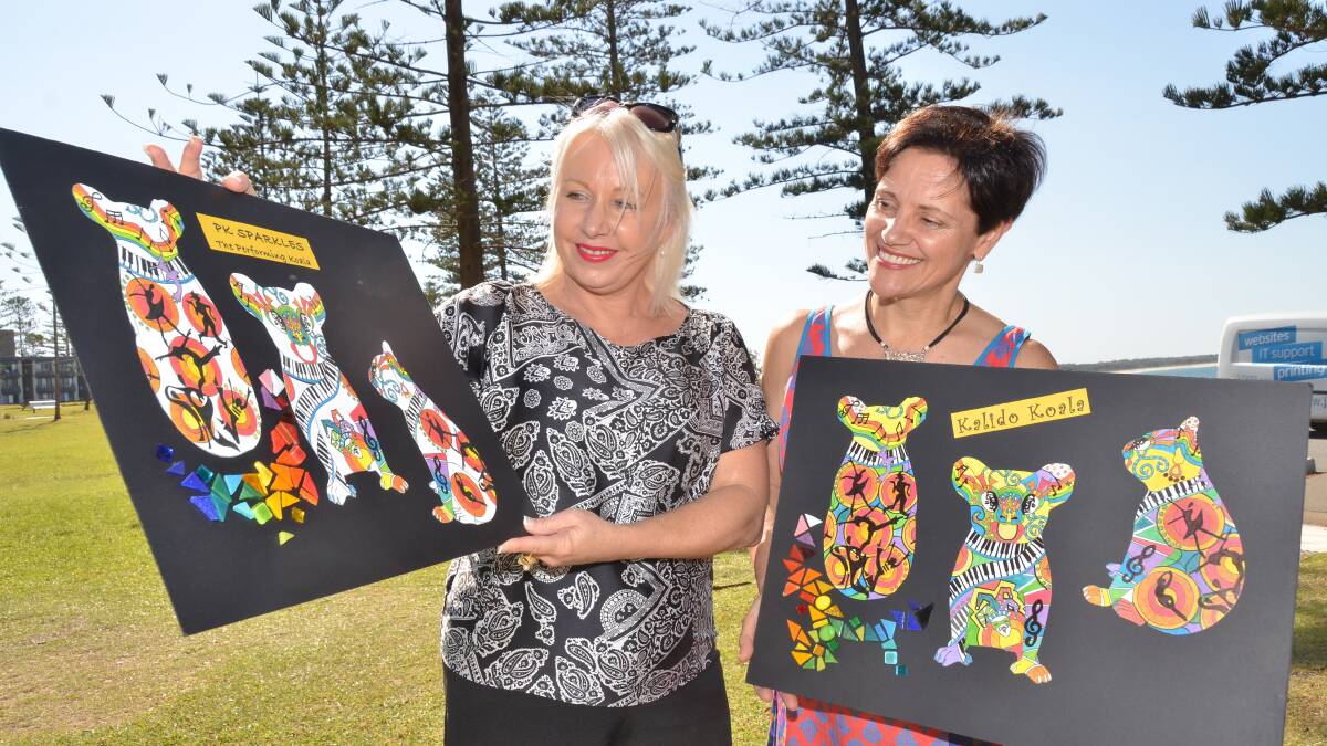 Artist Francesca O’Donnell, at right, shares her mosaic design submissions with Hello Koalas project manager Linda Hall (left).