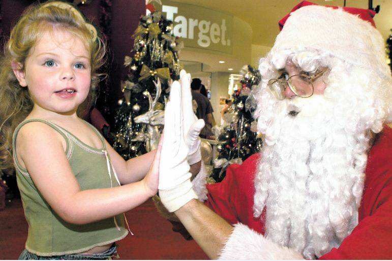 The newsmakers of 2003 ... high-fiving Santa.