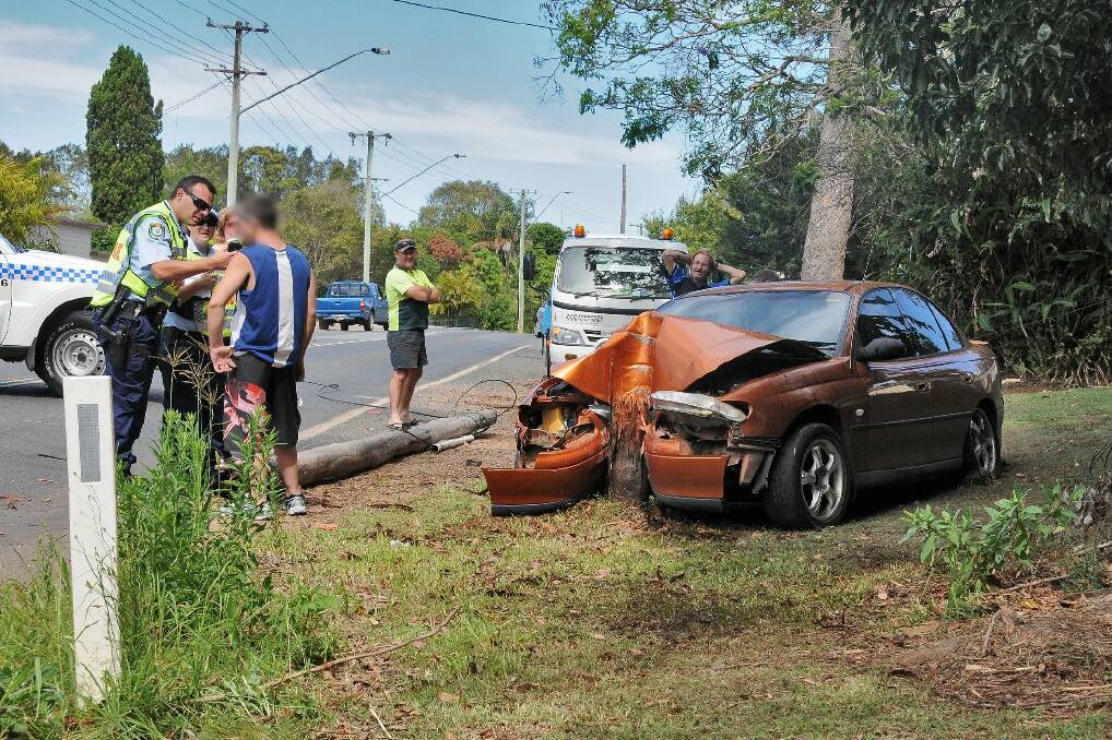 This was the scene of a very bad car accident in which a driver snapped a large telegraph pole in half. Somehow the driver walked away unscathed. The photograph is a favourite of mine as it shows the dejection of the  driver as he's given a roadside breath test with the utter carnage of the wreck shown just metres away. Pic: MATT ATTARD