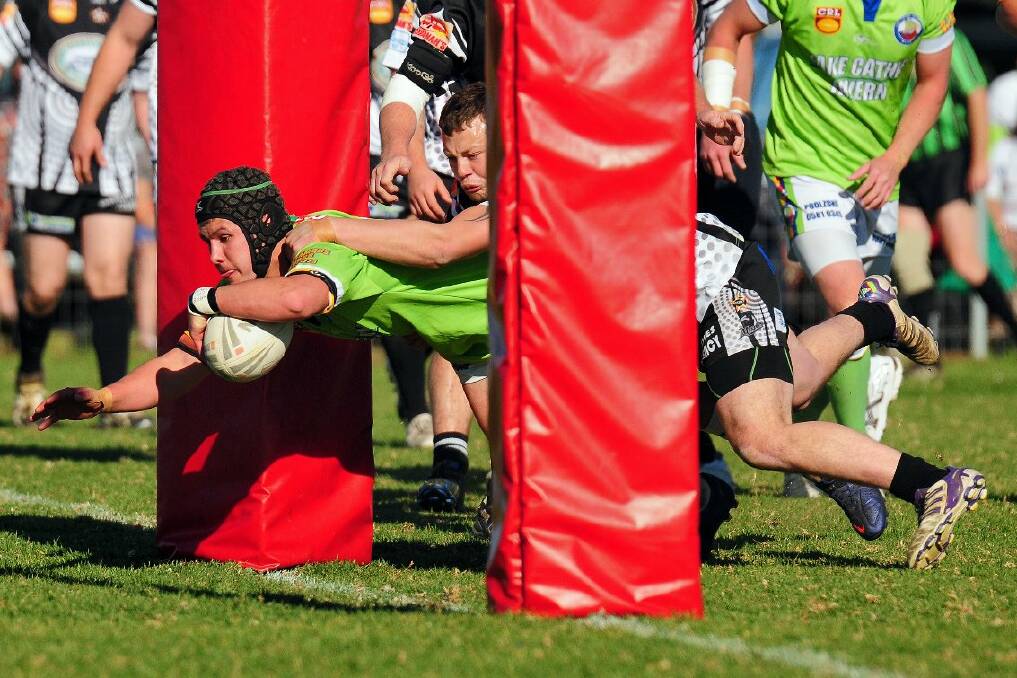 Lake Cathie Raiders player Matt Johl scooted from dummy half and dove over for a try between the posts. Being in the corner, I was able to capture the try from a unique angle as he popped through the opening of the goalposts. Pic: MATT ATTARD