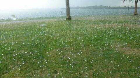 the Town Green near Rydges turned, well, a speckly green-white on Tuesday afternoon. From Ann Johnson.