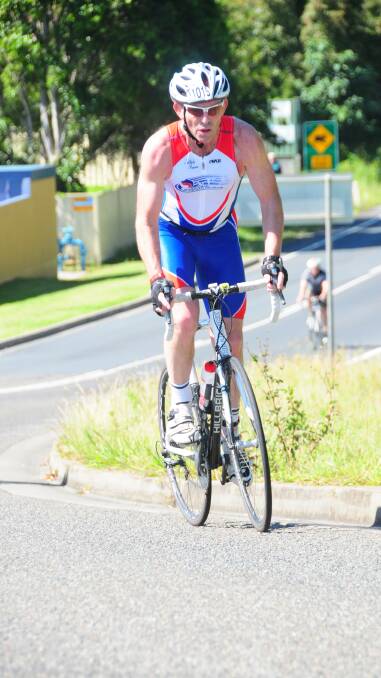 Tony Abbott out on the 2011 Ironman course.