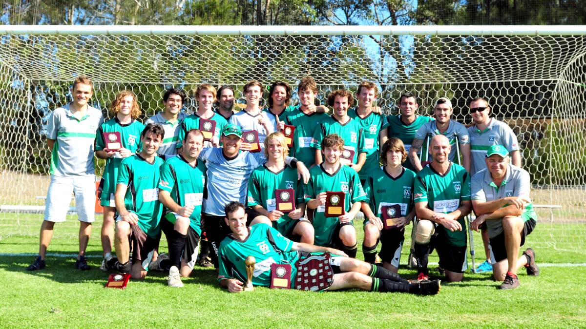 We are the champions:  Port United celebrates reserve grade victory on Saturday.
