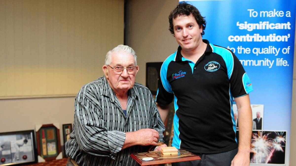 With a legend: Chris Cole, right accepts his Arthur Hollis Medal from the man himself last Saturday night.
