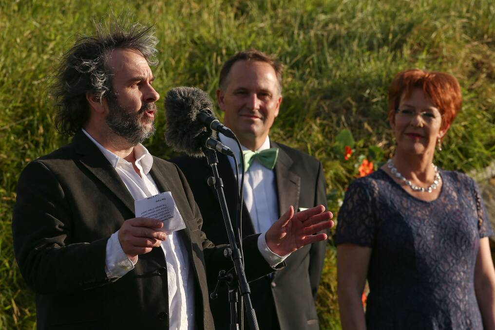 Director Sir Peter Jackson makes a speech while New Zealand Prime Minister John Key and Wellington Mayor Celia Wade-Brown look on at the 'The Hobbit: An Unexpected Journey' World Premiere at Embassy Theatre in Wellington, New Zealand. Photo by Hagen Hopkins/Getty Images