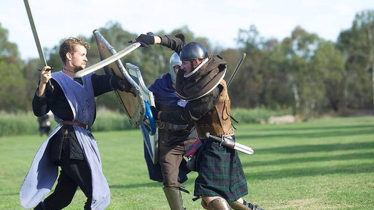 Competitors in the Swordcraft event at Darebin Gardens, Melbourne Photo: Simon Schluter