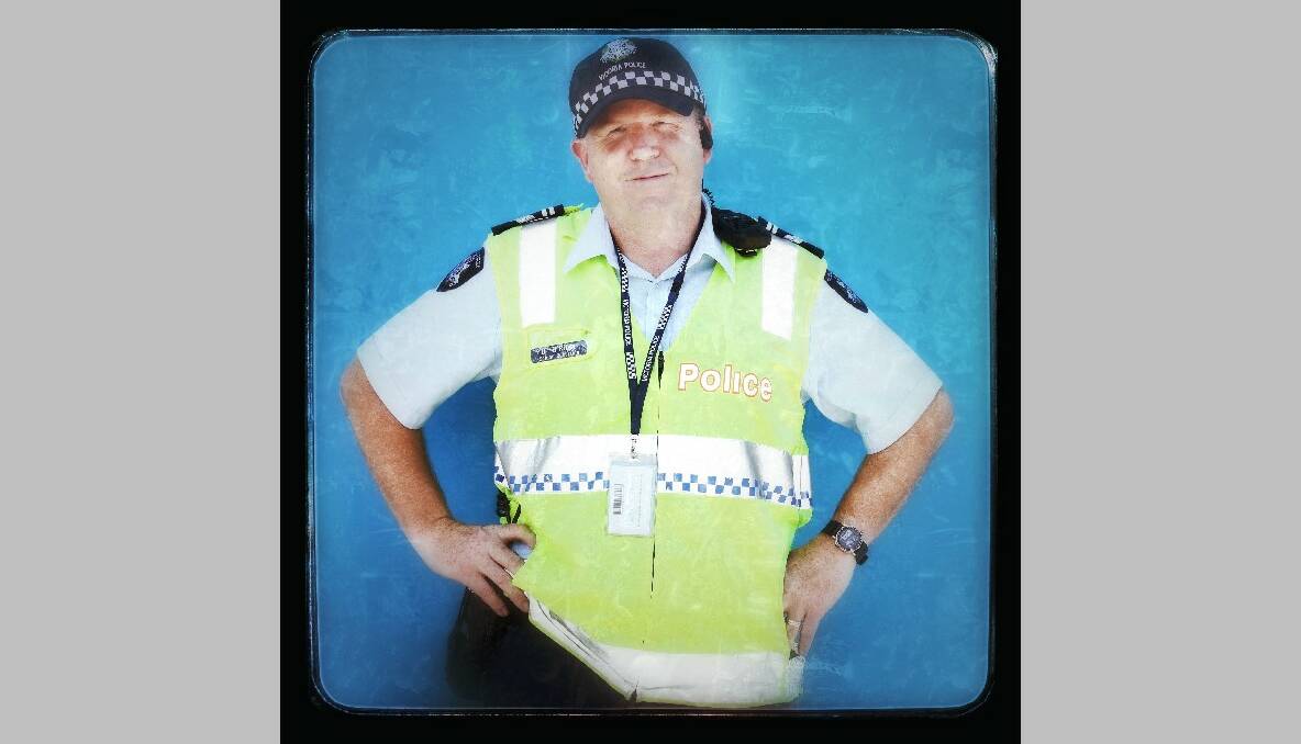 Police man David O'Riley, 46, from Melbourne attends the 2013 Australian Open. Photo by Marianna Massey/Getty Images