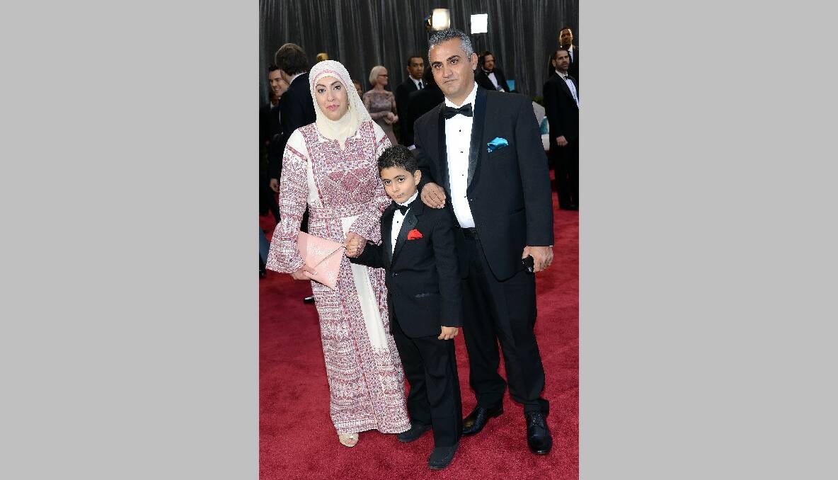 Best Documentary Feature nominee Emad Burnat his wife Soreya and son Jibrel. Photo: Getty Images