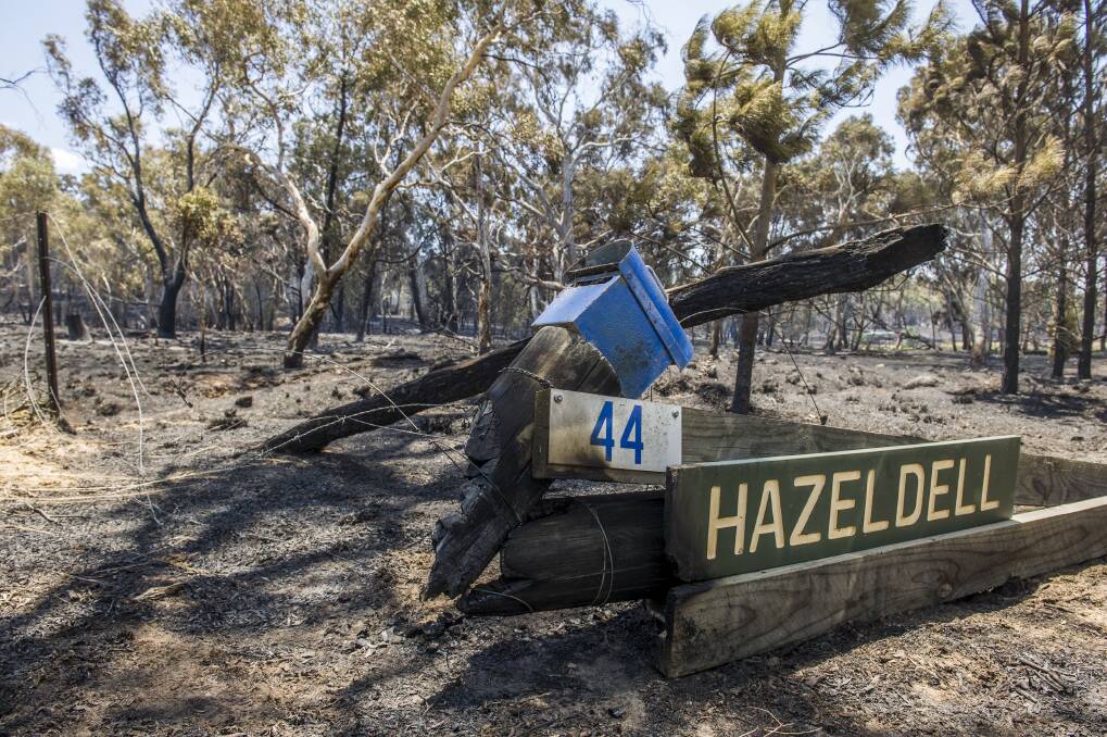 A burnt fence and letterbox on Hazeldell Rd, near Bungendore on January 9, 2013. Photo: Rohan Thomson