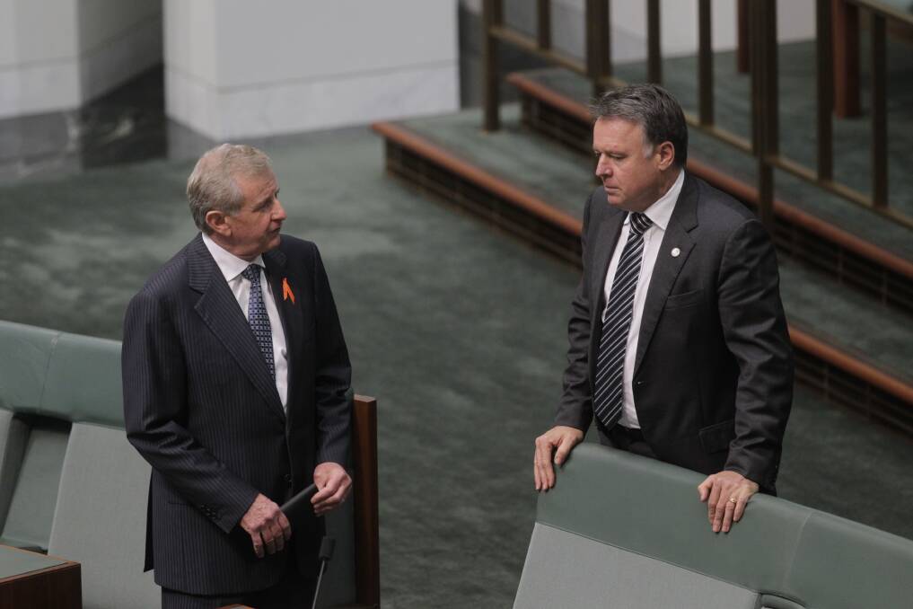 Sacked Arts Minister Simon Crean and Chief Government Whip Joel Fitzgibbon arrive for question time at Parliament House in Canberra. Photo: Fairfax Media