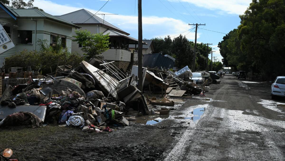 The fallout at Cromer Street in Lismore after floods swept through the NSW Northern Rivers town in early 2022. Picture by Cathy Adams