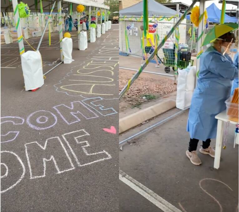 The Howard Springs check-in area was decorated with Australian flags, green and gold ribbons and messages such as "welcome home" written in chalk. Source: TikTok @emilyseebohm