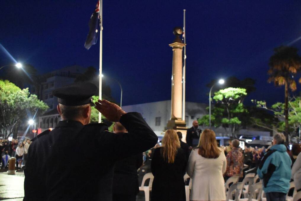 Hundreds of people gathered at Port Macquarie's cenotaph for the Anzac Day dawn service. Picture by Mardi Borg