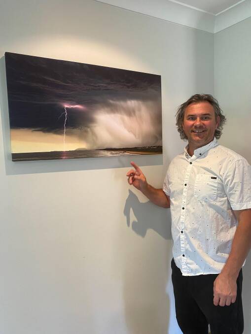 Ivan Sajko has his Lightning Strike photo on a canvas at his home. Picture supplied by Ivan Sajko