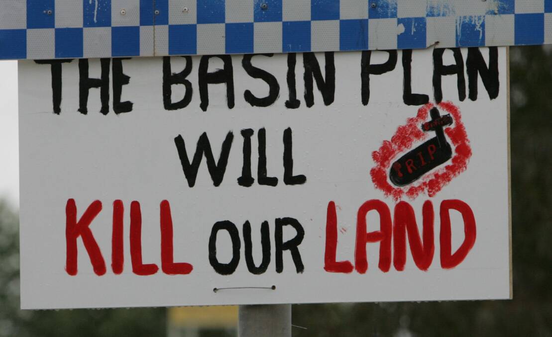 A sign placed before a murray darling basin plan meeting in Griffith, NSW. File picture