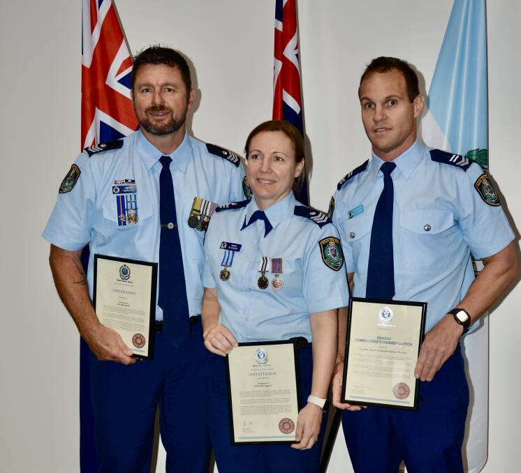 Sgt Ian Marshall, Sgt Michelle Eggert and Leading Sen. Con. Robert Davison were recognised for their actions during the armed robbery of the Crescent Head Country Club in October 2019. Picture supplied/NSW Police