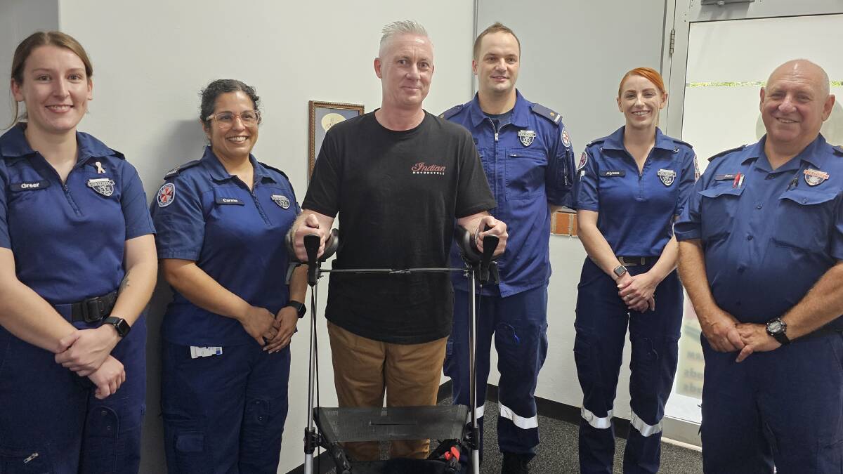Michael Bonfield with Mr Gavin (far right) and the team of Paramedics that saved his life. Picture by Reidun Berntsen. 