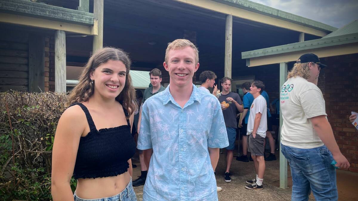 Tia McGrath and Elliot Worner celebrate their HSC results with their fellow students at MacKillop College. Picture by Emily Walker