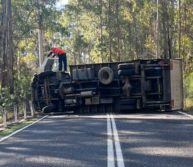 Port Macquarie resident Dave Nichols was first at the scene at the truck rolloever on the Oxley Highway. Picture supplied by Alistair Flower