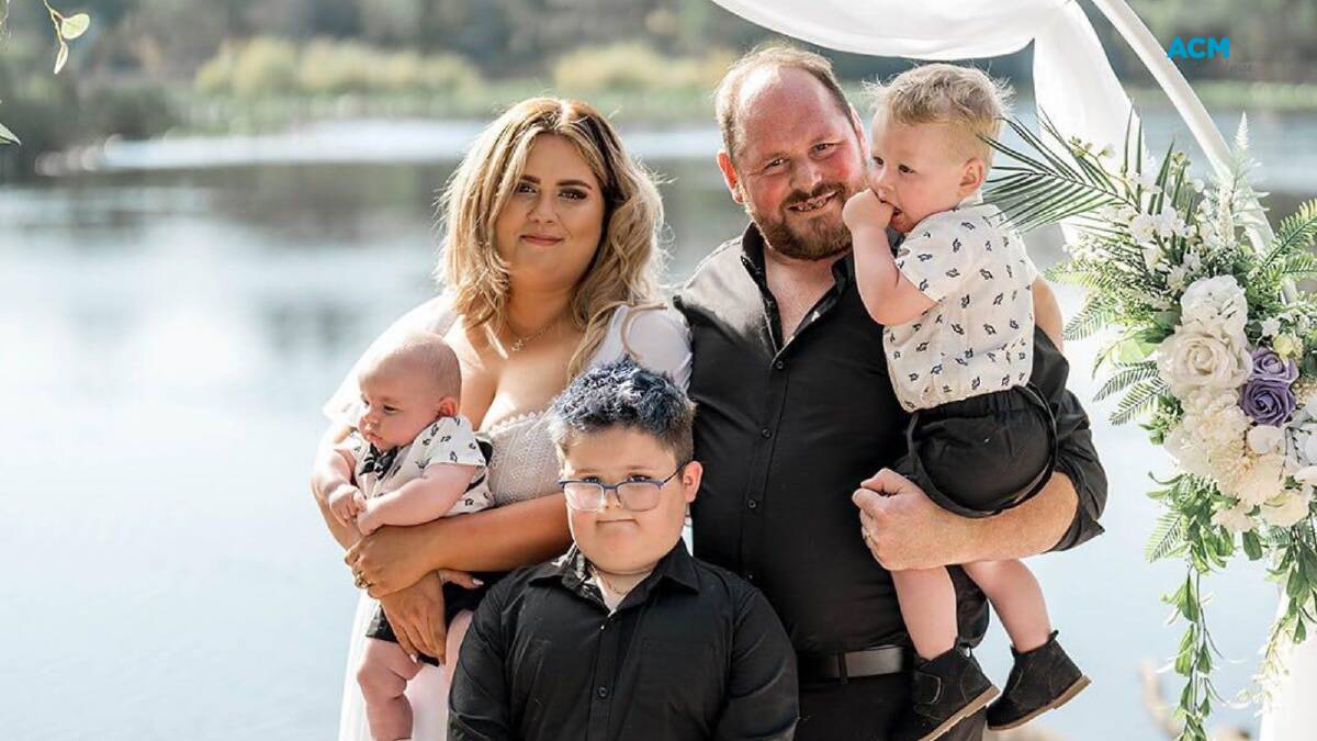 Jessica and Jamie Rowley with their kids on their wedding day. Picture supplied