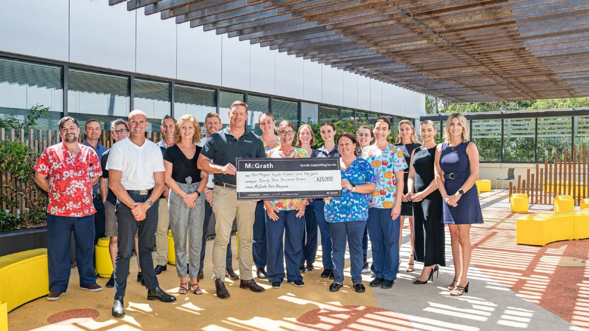McGrath Estate Agents Port Macquarie principals Katrina and Todd Bates, and their team, presenting donation to Nurse Unit Manager Darlene Malineack and the hospital's paediatric nurses. Picture supplied.