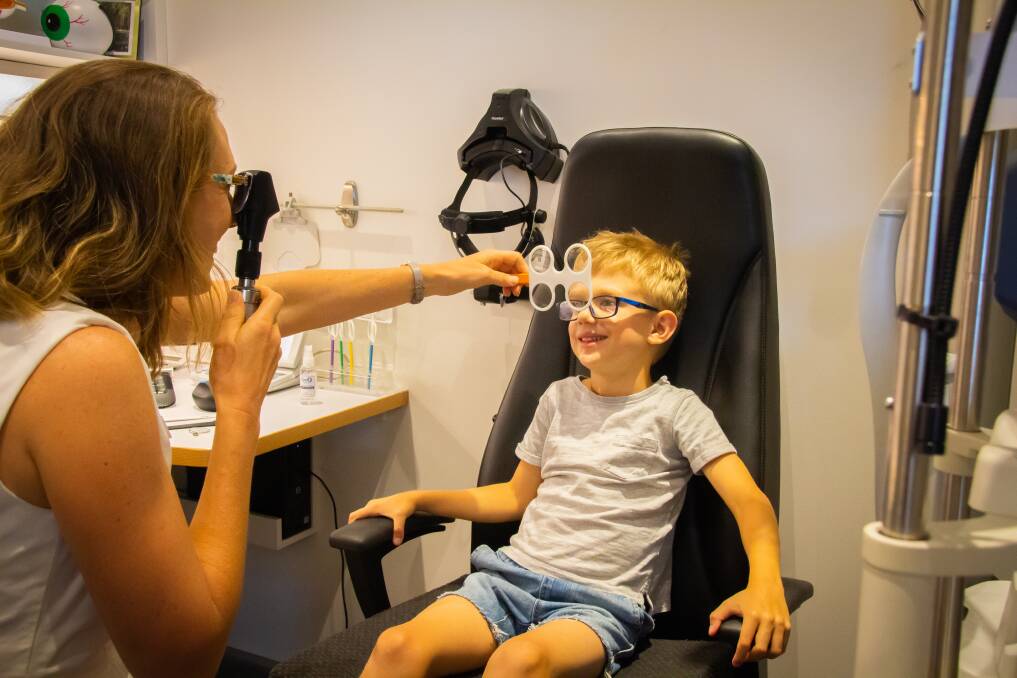 Eye Check: Local 5 year old Cooper Raywood seen here having his regular vision review with local Optometrist Linda Chase. 